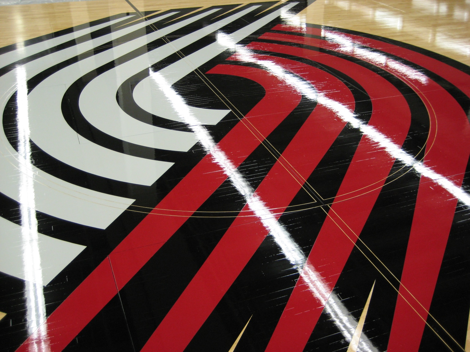 Portland Trail Blazers Moda Center, Portland, Oregon - portable basketball court painted and refinished by COURTSPORTS.