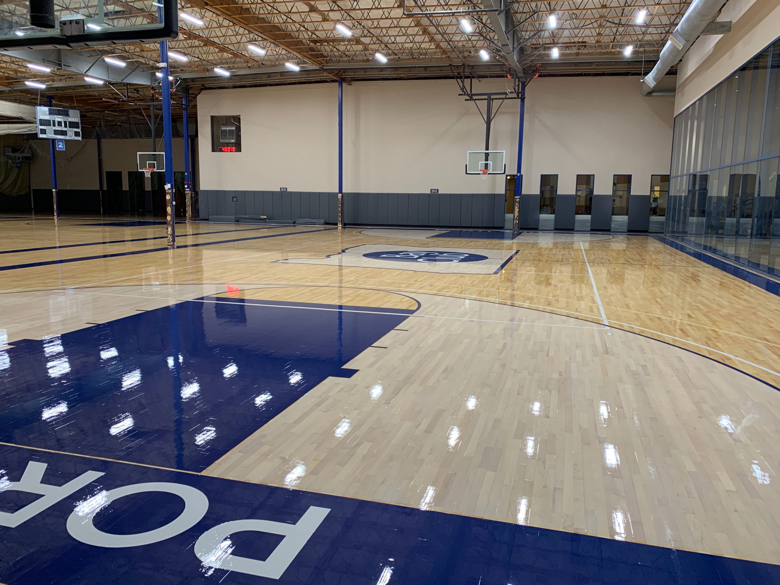 Bay Club, Portland, Oregon - basketball gym floor sanding and refinishing by COURTSPORTS.