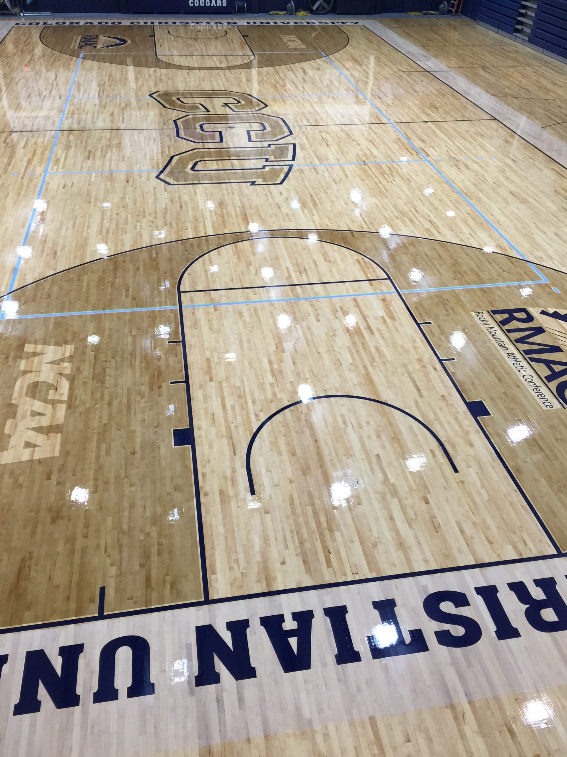 Colorada Christian University, Denver, Colorado - full drum sanding and refinishing of their gym floor by COURTSPORTS.