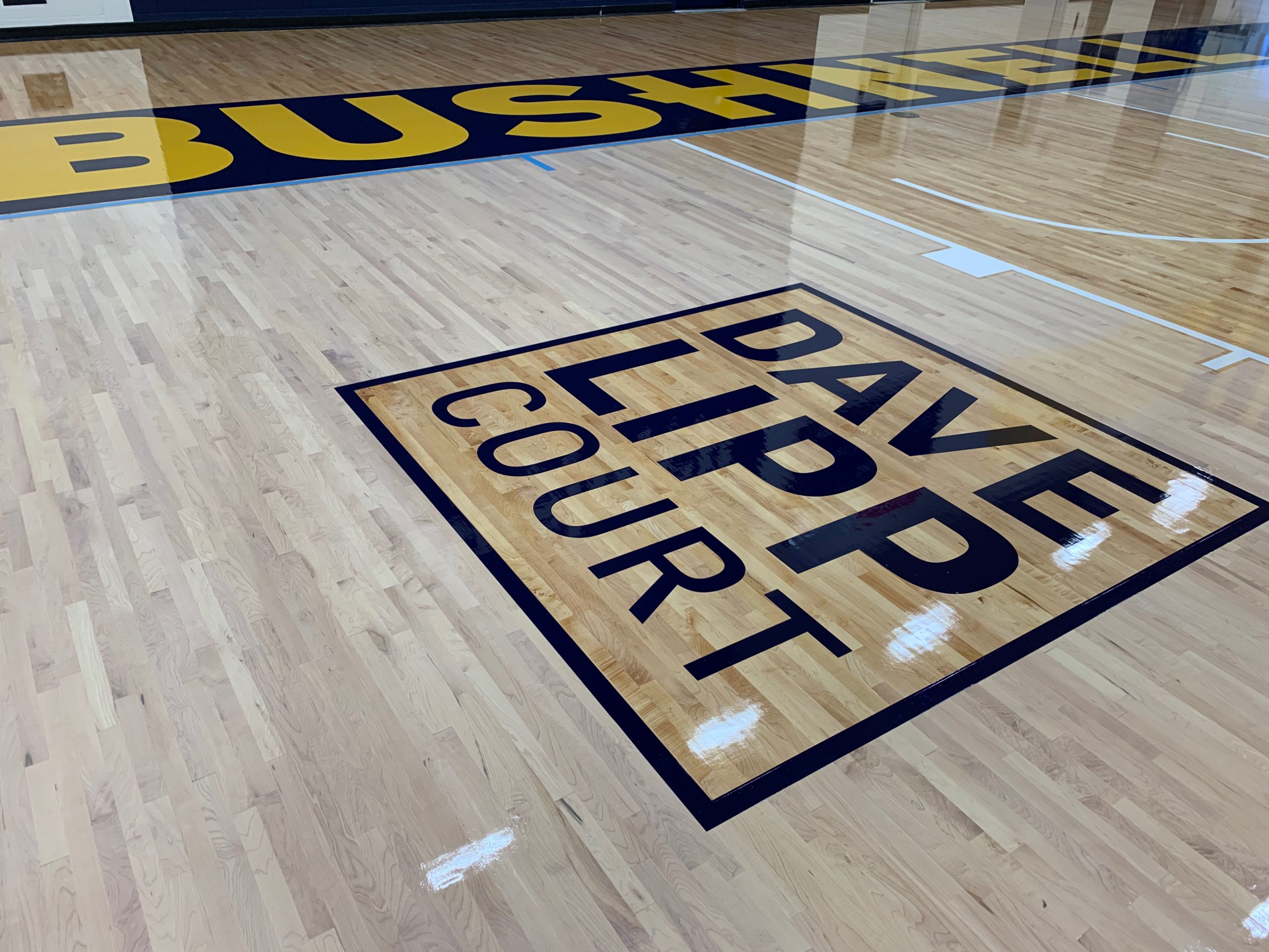 Bushnell University, Eugene, Oregon - Basketball court logos and painting by COURTSPORTS