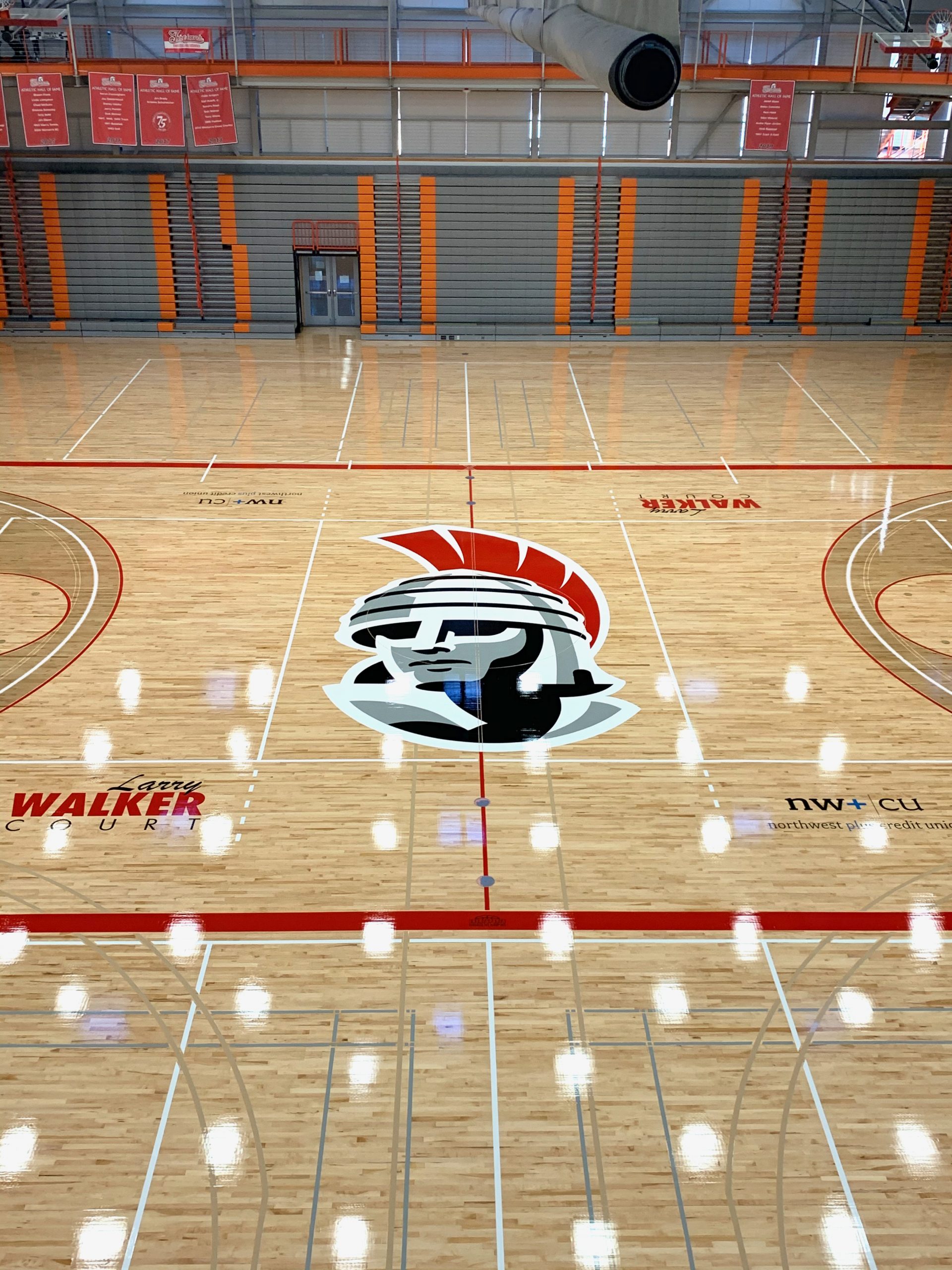 Everett Community College Trojans center logo painted using vinyl stencils by COURTSPORTS.
