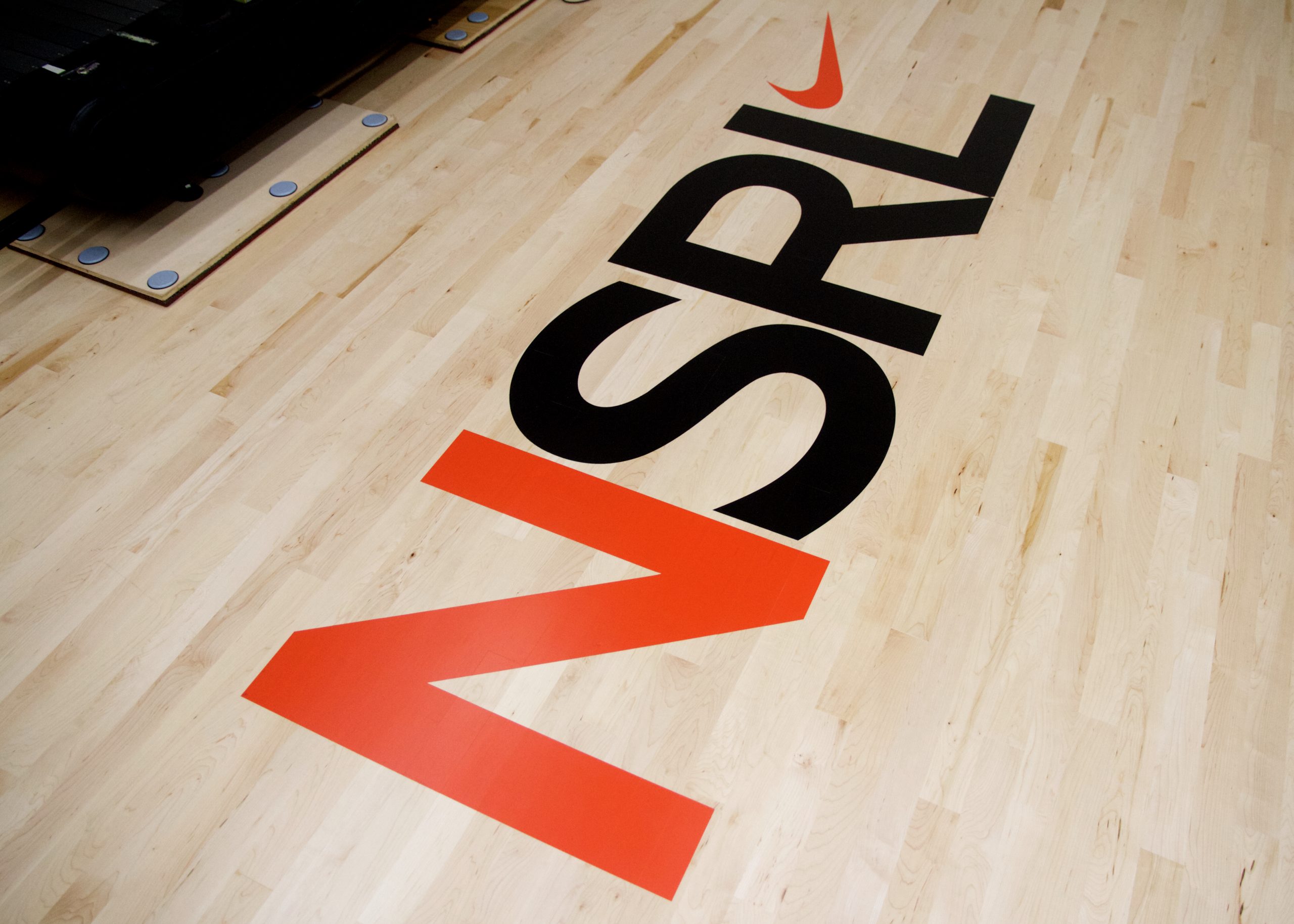 Nike NSRL top secret basketball court in the basement of the Mia Hamm building in Beaverton, Oregon. This was a new court install with slow motion cameras, pressure panels, and high tech/innovation build-ins. Installed, sanded, sealed, painted, and finished by COURTSPORTS