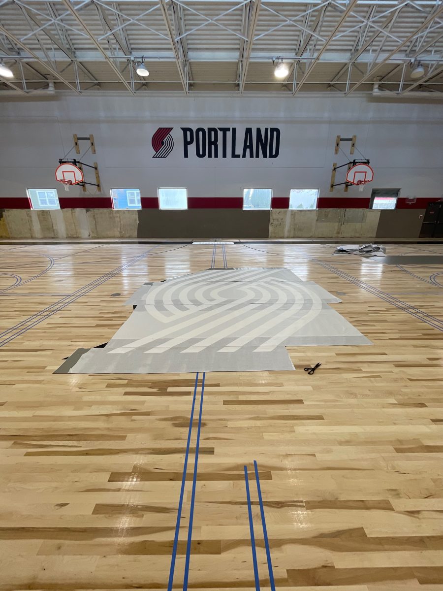 Large center logo stencil of the Portland Trail Blazers pinwheel logo for the Boys & Girls Club in Portland Oregon by COURTSPORTS