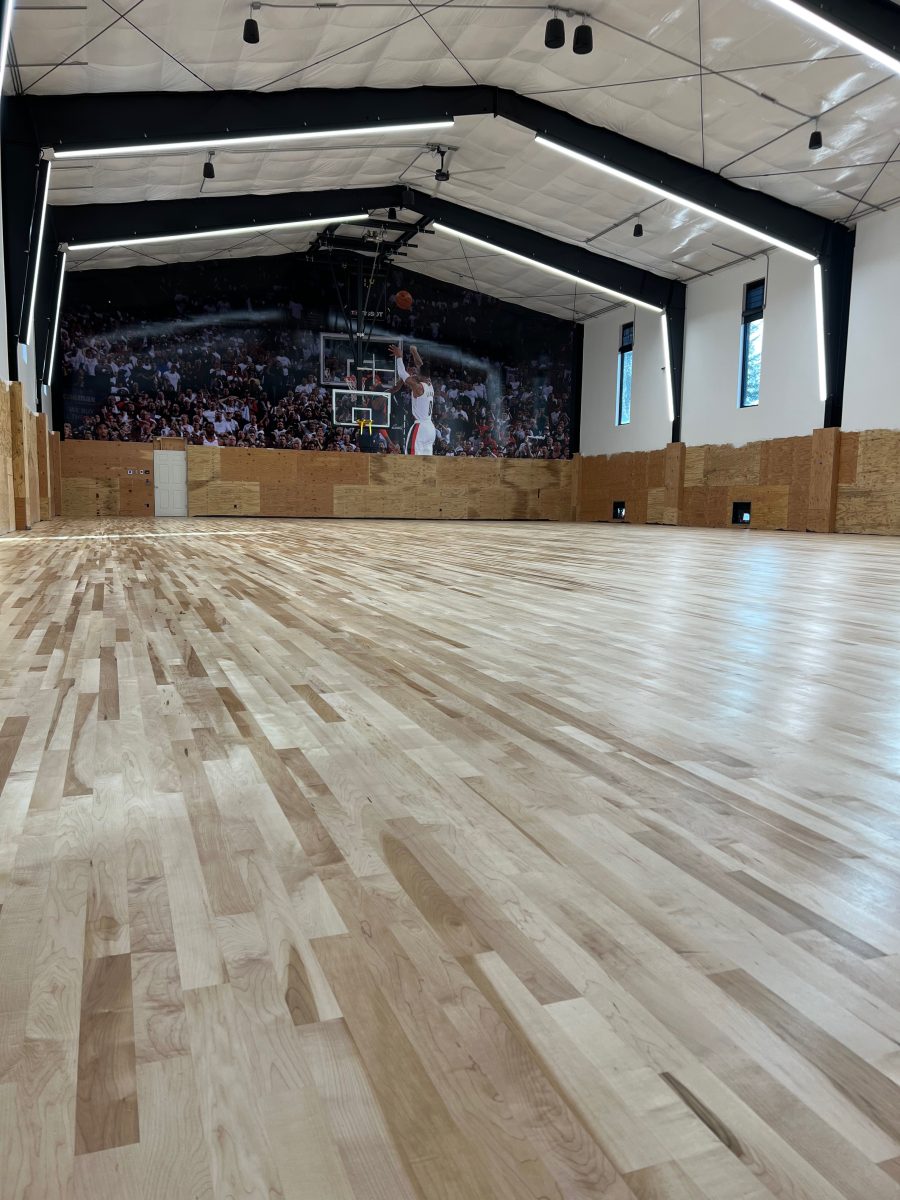 New NBA home court installed for an NBA player who played for the Portland Trail Blazers. Full NBA court sub floor, new maple flooring installed, sanded, sealed, game lines and logos painted