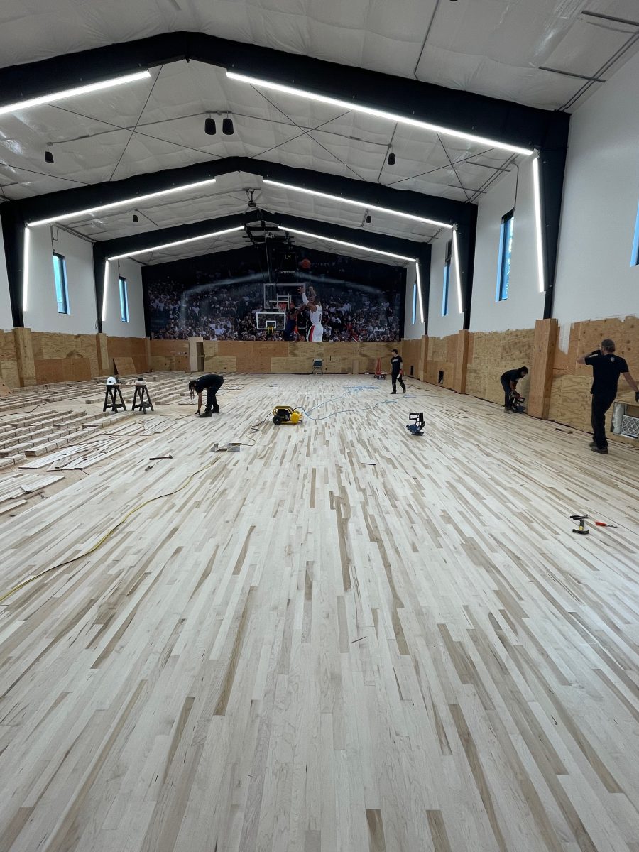 New NBA home court installed for an NBA player who played for the Portland Trail Blazers. Full NBA court sub floor, new maple flooring installed, sanded, sealed, game lines and logos painted