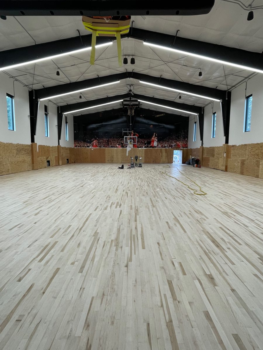 New NBA home court installed for an NBA player who played for the Portland Trail Blazers. Full NBA court sub floor, new maple flooring installed, sanded, sealed, game lines and logos painted