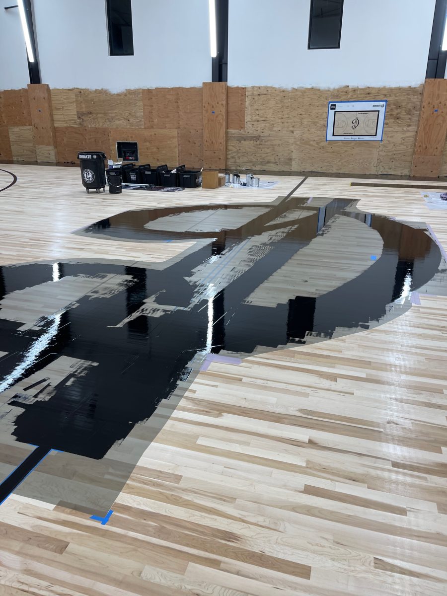 New NBA home court installed for an NBA player who played for the Portland Trail Blazers. Full NBA court sub floor, new maple flooring installed, sanded, sealed, game lines and logos painted