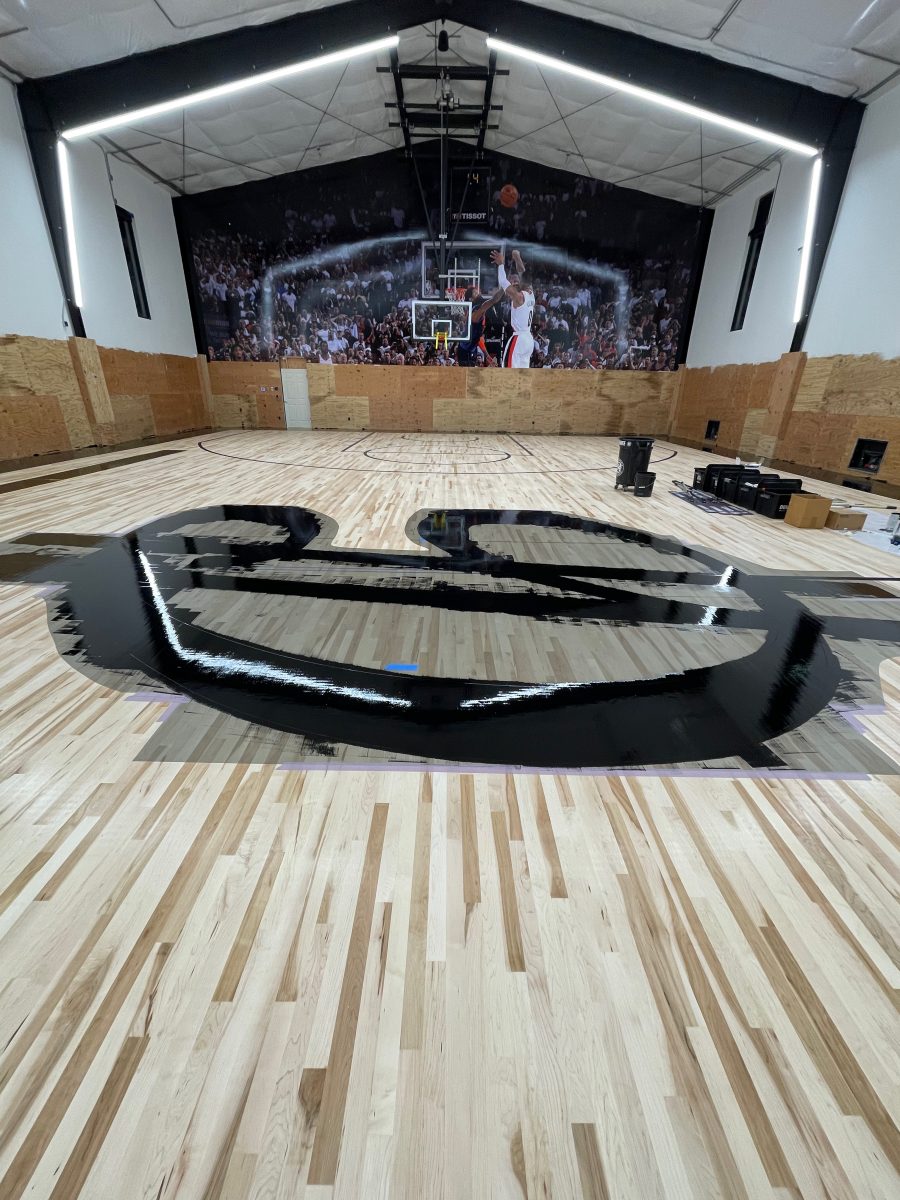 New NBA home court installed for an NBA player who played for the Portland Trail Blazers. Full NBA court sub floor, new maple flooring installed, sanded, sealed, game lines and logos painted