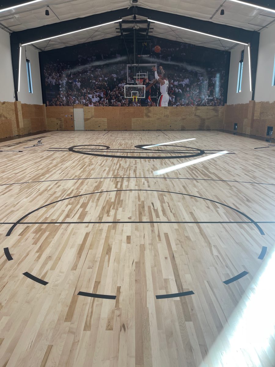 New NBA home court installed for an NBA player who played for the Portland Trail Blazers. Full NBA court sub floor, new maple flooring installed, sanded, sealed, game lines and logos painted