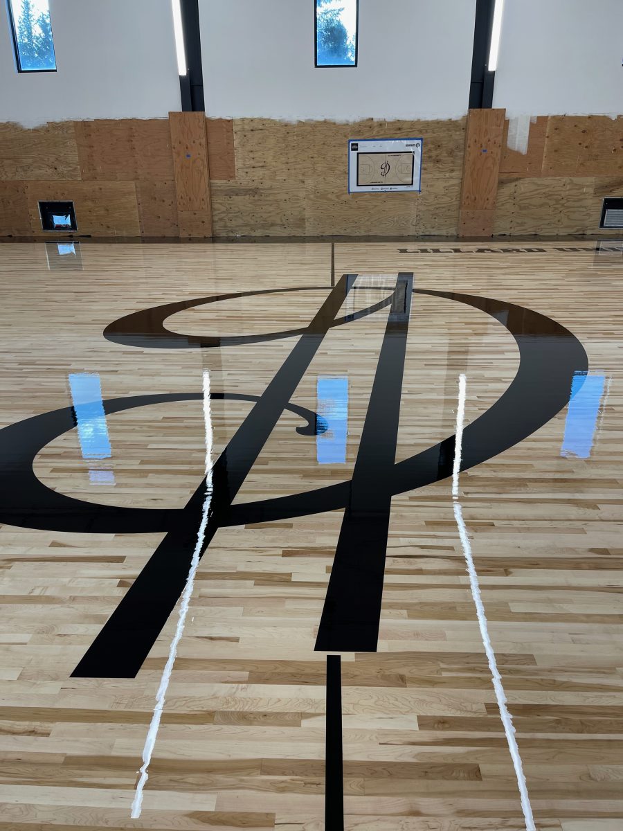 New NBA home court installed for an NBA player who played for the Portland Trail Blazers. Full NBA court sub floor, new maple flooring installed, sanded, sealed, game lines and logos painted