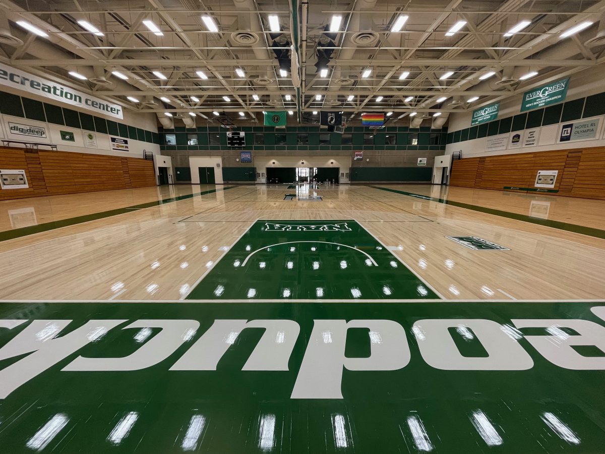 Evergreen State College, Olympia, Washington - full sanding and refinishing of their basketball gym floor and volleyball court by COURTSPORTS.