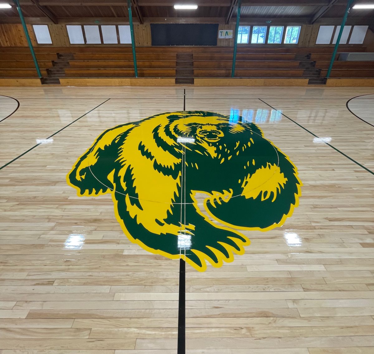 High school basketball court sanded and refinished by COURTSPORTS.