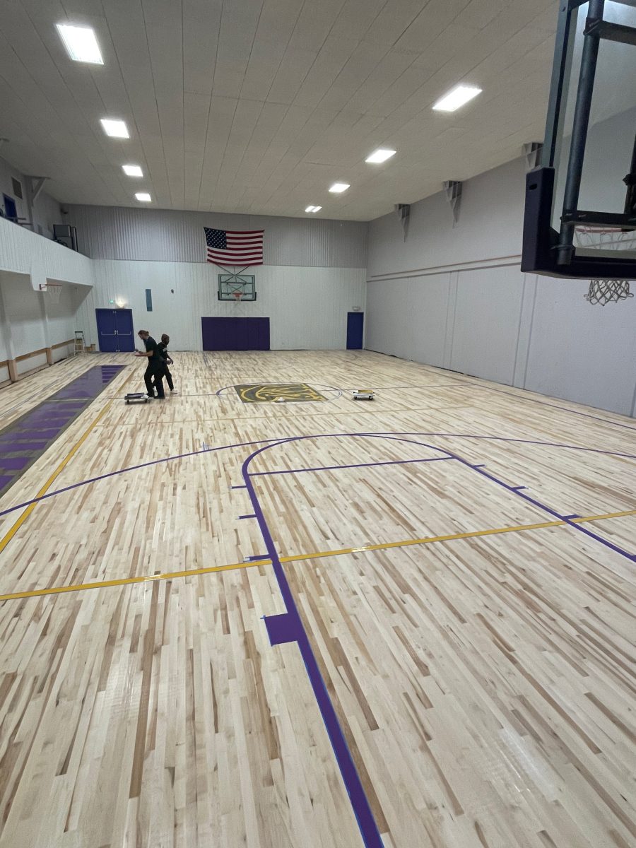 New high school basketball gym floor installed by COURTSPORTS.
