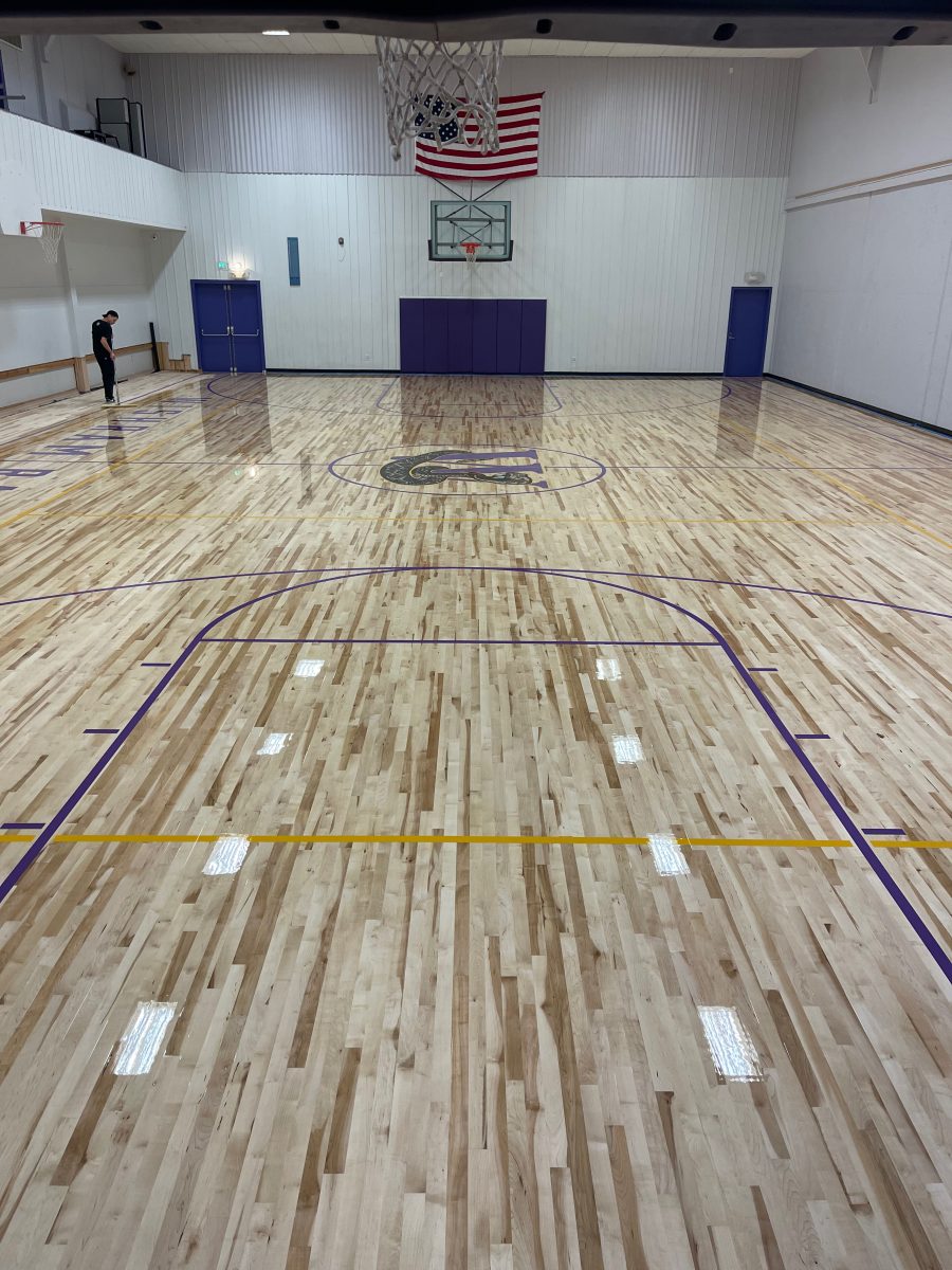New high school basketball court installation by COURTSPORTS.