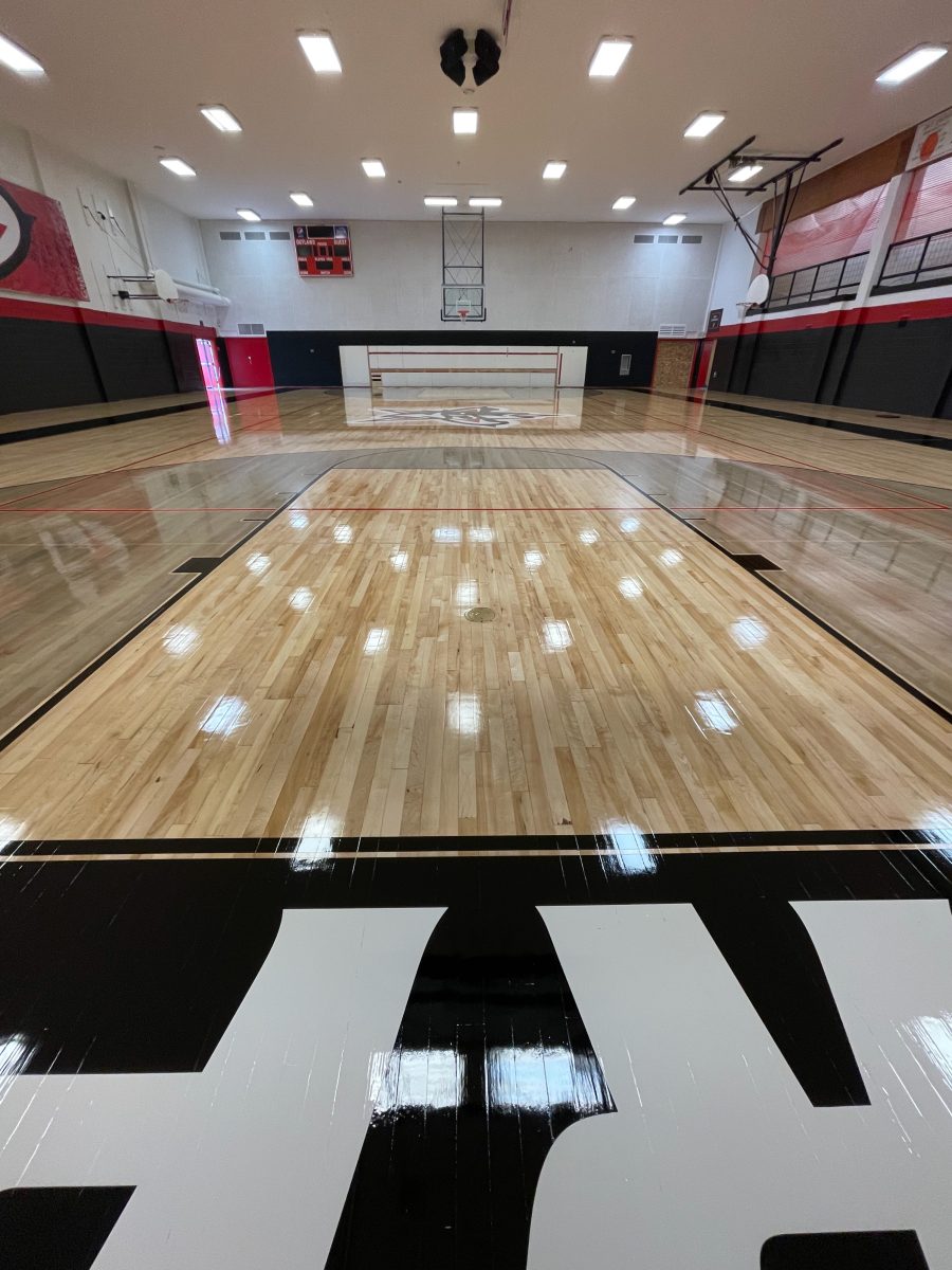 Enterprise High School gym floor sanding and refinishing by COURTSPORTS.